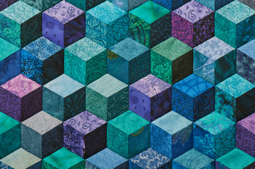 Detail of quilt sewn from rhombuses