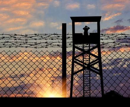 Silhouette of a lookout tower and borders
