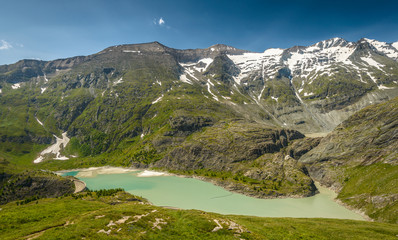 Fototapeta na wymiar Mountain lake in the national park Hohe Tauern in Austrian Alps.