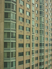 Elegant, modern green and brown facade building on Manhattan