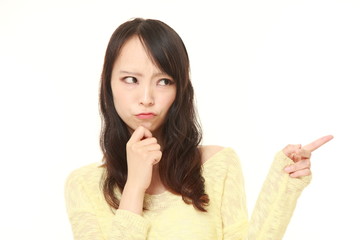 Naklejka premium young Japanese woman doubting