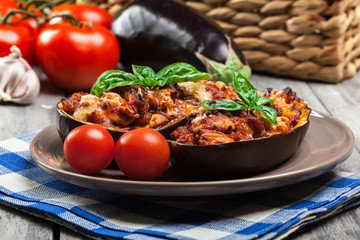 Baked eggplant with pieces of chicken