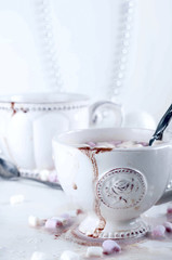 White cup of hot cocoa 