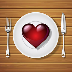 fork with knife and red heart shape on plate
