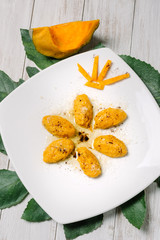 Pumpkin gnocchi with licorice powder