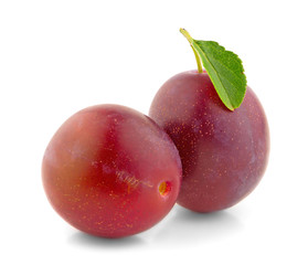 Fresh plums with leaf