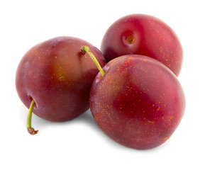 Fresh plums with leaf