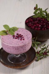 Banana smoothie with cranberries and yogurt