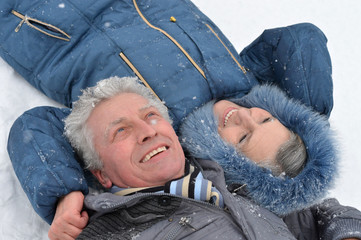 senior couple at winter outdoors