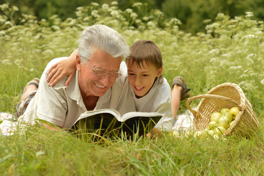 Grandfather And  Grandson Reading Book