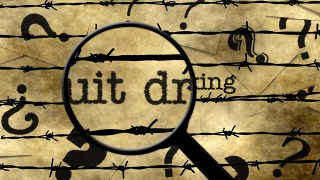Magnifying glass on quit drinking 