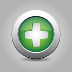 green metal button with plus