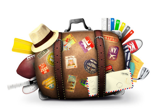 Full suitcase of a traveler with travel stickers