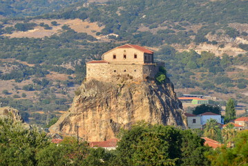Fototapeta na wymiar church of Our Lady of the Sweet Kiss sits atop a rock outcrop above the town of Petra, Lesbos