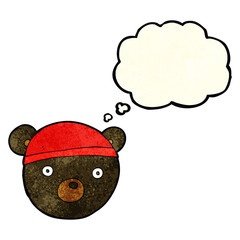 cartoon black bear cub wearing hat with thought bubble