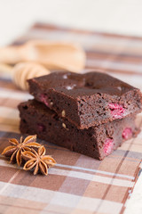 Chocolate brownies with raspberries
