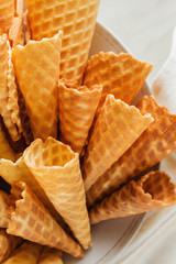 Waffle cones on plate. Top view