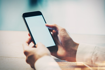 Close up of girl's hand using smart phone 