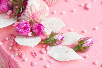 Pink rose buds and white chocolate leaves