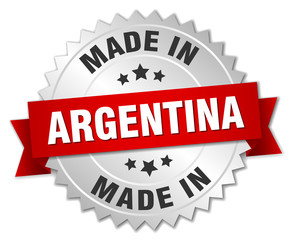 made in Argentina silver badge with red ribbon