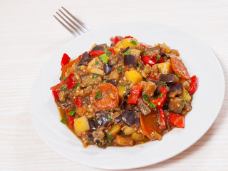 stewed vegetables. eggplant, peppers, onions, carrots, potatoes.