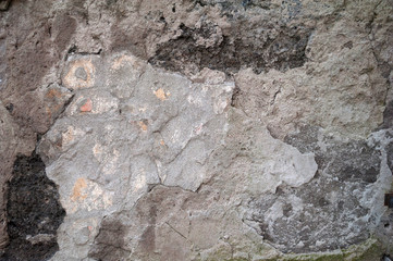 Texture of old wall covered with gray stucco