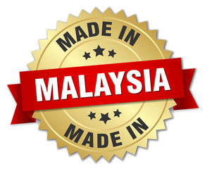 made in Malaysia gold badge with red ribbon