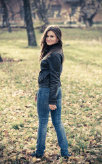 young woman portrait in autumn park