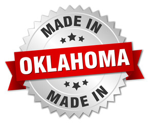 made in Oklahoma silver badge with red ribbon