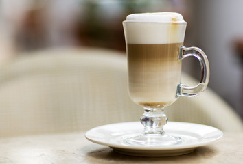 Coffee Latte in a glass on the table. 