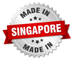 made in Singapore silver badge with red ribbon
