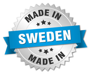 made in Sweden silver badge with blue ribbon