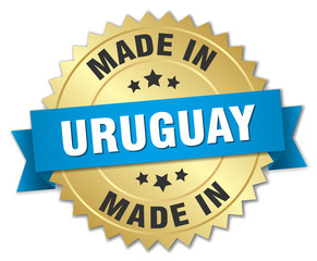 made in Uruguay gold badge with blue ribbon