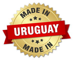made in Uruguay gold badge with red ribbon