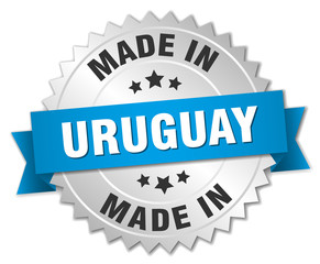 made in Uruguay silver badge with blue ribbon