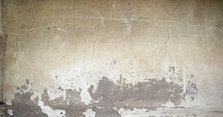 Raamstickers Verweerde muur Textuur van oude muur bedekt met geel stucwerk