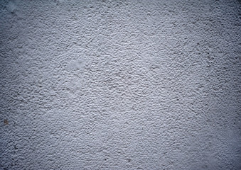 Texture of old wall covered with gray stucco