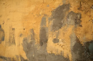 Fototapete Alte schmutzige strukturierte Wand Textur der alten Mauer mit gelbem Stuck bedeckt