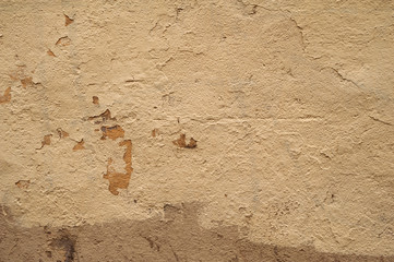 Texture of old wall covered with gray stucco