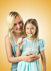 Mother with daughter isolated on white