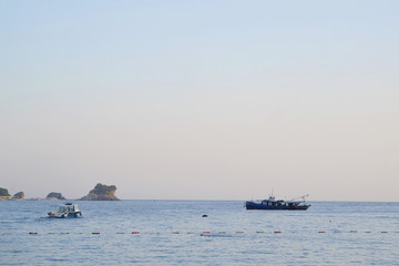 Boat in the Adriatic sea in Budva , Montenegro
