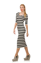 Young woman in long striped dress isolated on white