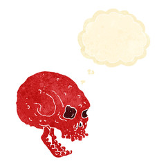 cartoon spooky skull with thought bubble