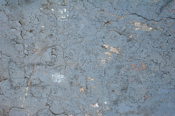 Texture of old wall covered with gray stucco