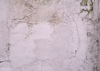Obraz premium Texture of old wall covered with pink stucco
