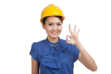 Asian engineer woman show OK sign
