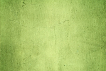 Texture of old wall covered with green stucco