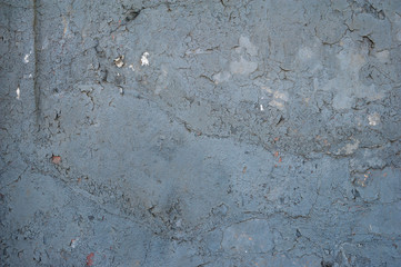 Texture of old wall covered with gray stucco