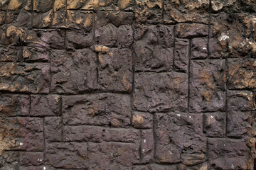 Texture of old wall covered with brown stucco