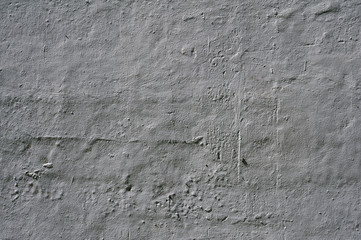 Texture of old wall covered with gray stucco